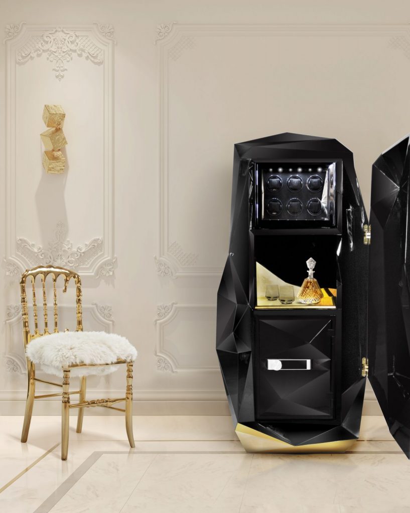 luxury safes- luxurious black safe, gold chair and white fur, white walls and gold lamp